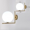 Applique da parete con sfera in vetro G9 metallo oro lampada design moderno minimal