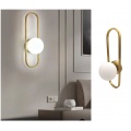 Applique da parete con sfera in vetro bianco ovale metallo Oro attacco G9 lampada design moderno minimal