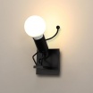 Applique da parete omino uomo salta alzato bianco nero attacco E27 lampada particolare moderno per camera cameretta bambini