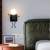 Applique da parete omino seduta bianco nero attacco E27 lampada particolare moderno per camera cameretta bambini