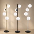Lampada da terra con 4 sfere oro argento nero in vetro bianco piantana design moderno per salotto camera
